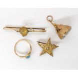 A 9ct gold Masonic fob seal and star badge, a 9ct turquoise ring size O, and a 9ct citrine brooch,