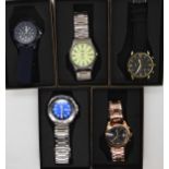 A collection of fashion watches Condition Report:Condition report: Not available for this lot.