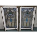 A pair of leaded stained glass windows depicting a thistle with saltires in the corners, 80cm high x