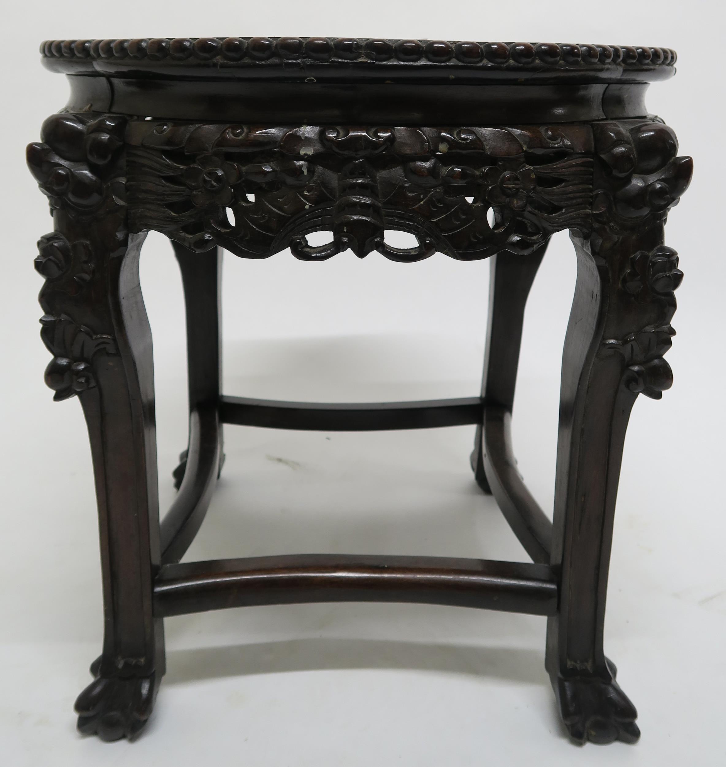 An Oriental hardwood marble top occasional table Condition Report:Available upon request - Image 3 of 3