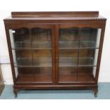 A 20th century mahogany glazed display cabinet, 122cm high x 123cm wide x 32cm deep  Condition