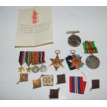 A World War II group of medals, miniature set, various buttons etc  Condition Report:Available