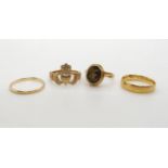 An 18ct gold Irish wedding ring hallmarked Dublin 1897, size O, together with three 9ct rings,