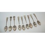 Nine silver tea spoons, London 1865, the finials engraved with initials, 180grams Condition Report: