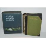 Two large albums of black and white and colour postcards including topographical, humorous etc,