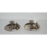 A pair of chamber candle sticks with snuffers Condition Report:Available upon request