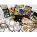 A collection of costume jewellery to include items by Swarovski, a vintage bunny in a top hat brooch