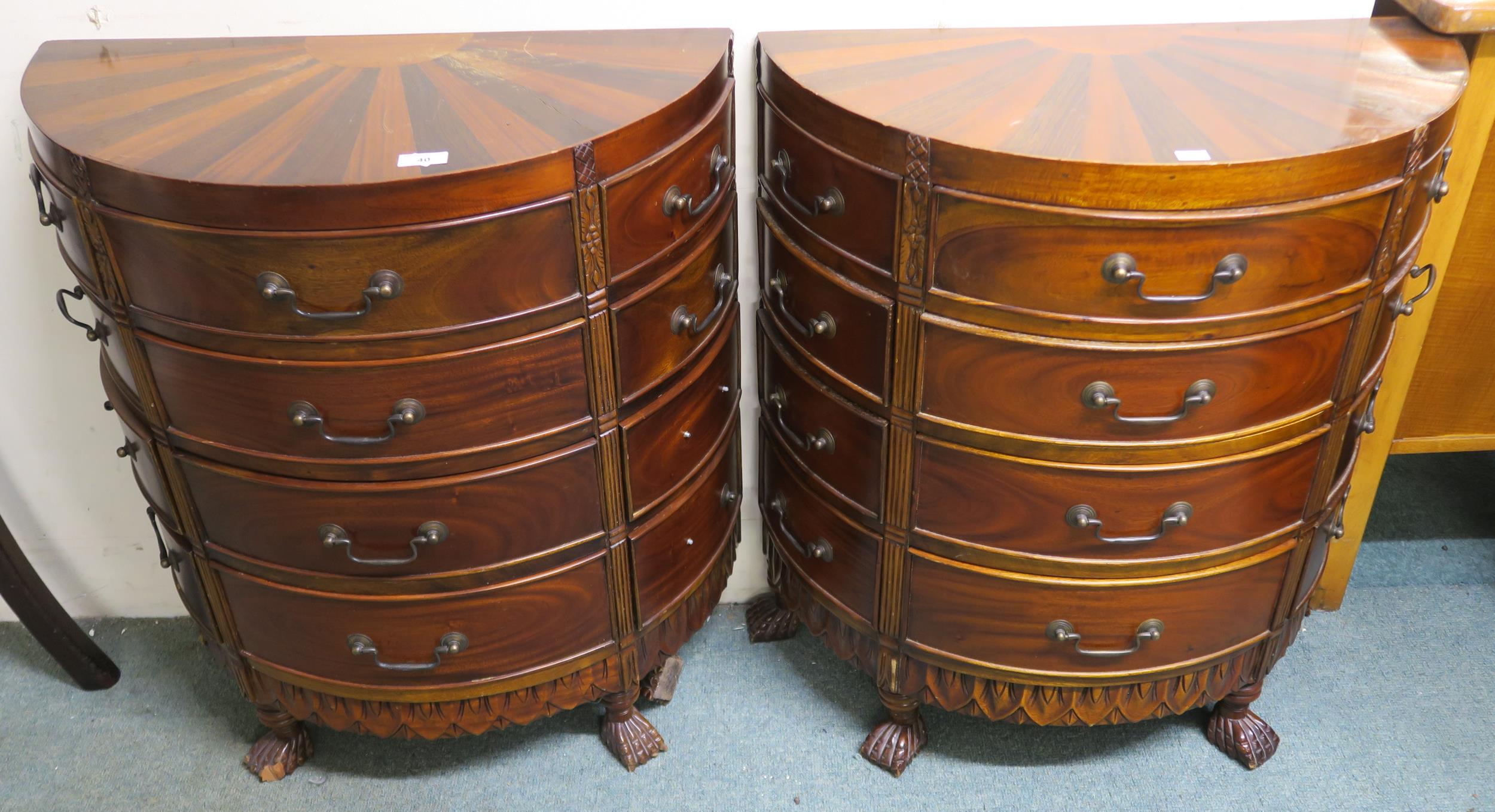 A pair of 20th century mahogany dome front twelve drawer chests (2) Condition Report:Available