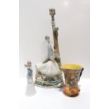 A Lladro figural table lamp base of a girl playing a mandolin, a Lladro figural bell modelled as a