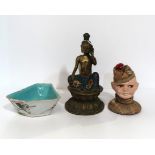 A brass buddha with enamel decoration, a Chinese sectional dish and a papier mache soldiers head pin