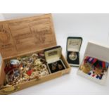 1st and 2nd World war medals, a 14k onyx and opal bird pendant and a collection of costume jewellery