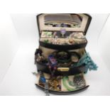 A jewellery box full of costume jewellery, to include an Art Nouveau style pendant Condition