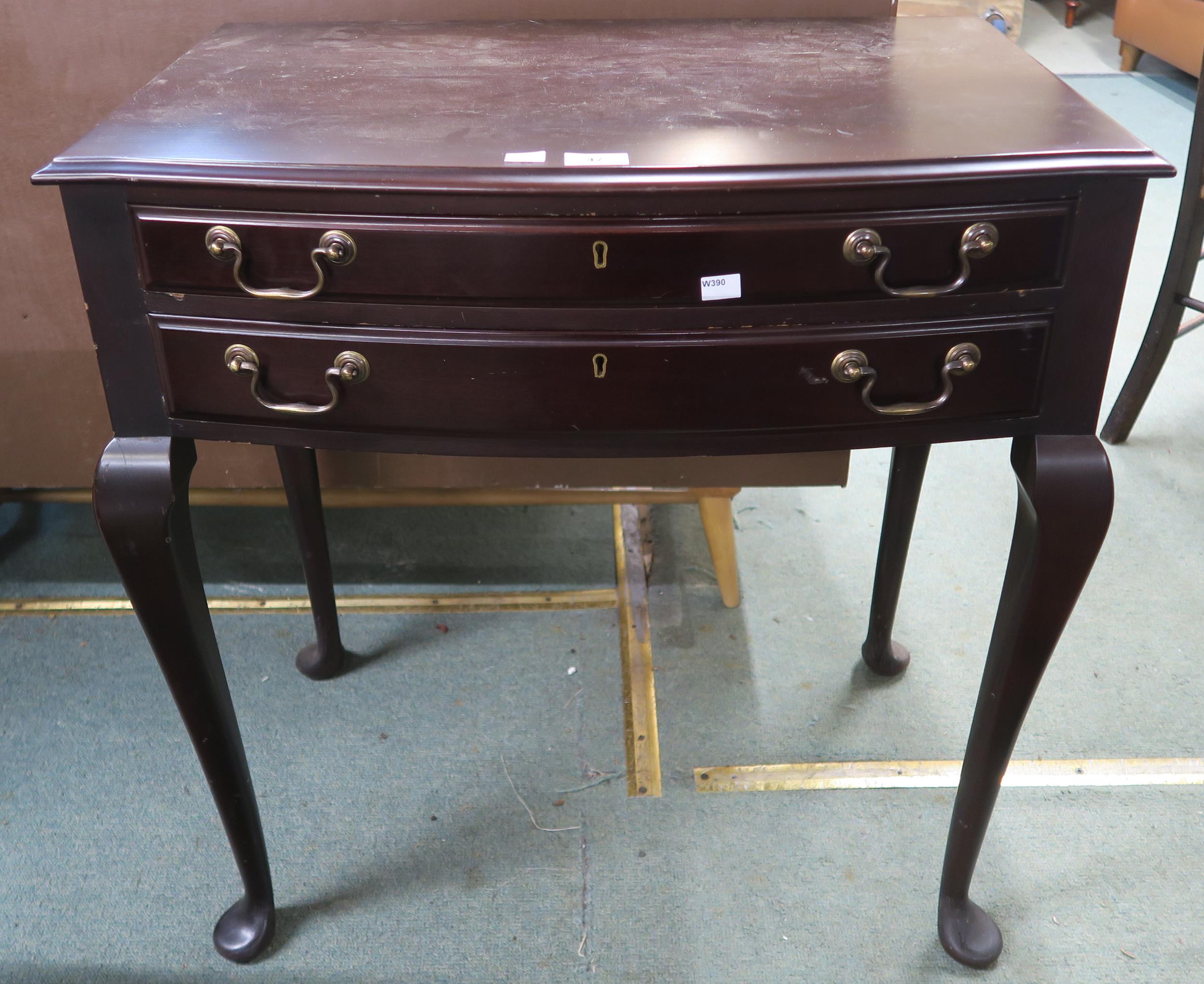 A 20th century mahogany two drawer canteen with silver plate contents and a mahogany drop end single