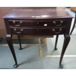 A 20th century mahogany two drawer canteen with silver plate contents and a mahogany drop end single