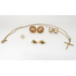 a 14k gold cross and chain weight 2.9gms, together with a collection of 9ct gold earrings to include