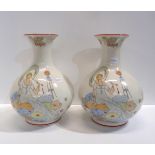 A pair of ceramic vases with printed Art Deco style decoration of a lady with a parasol Condition