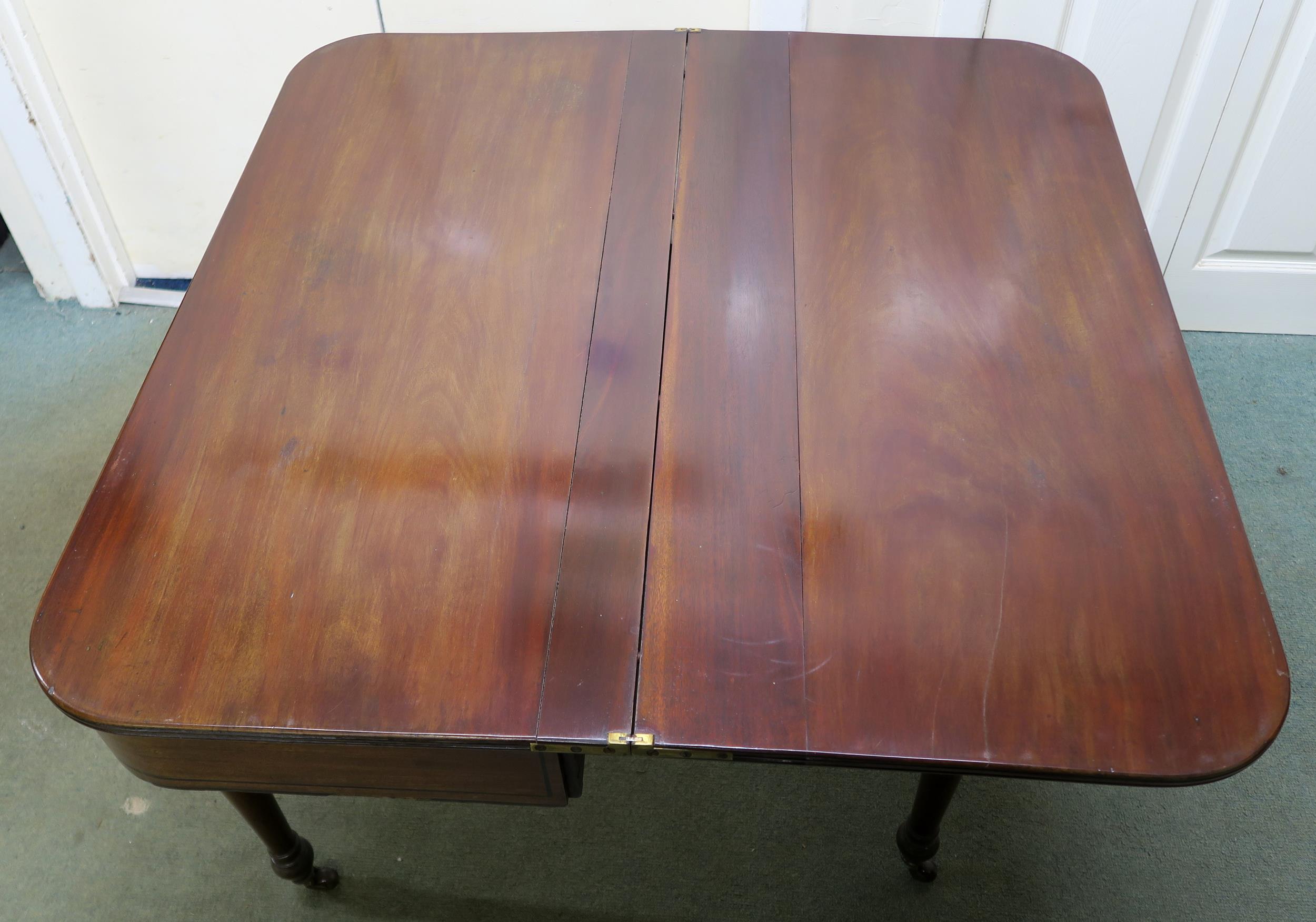 A Victorian mahogany single drawer foldover tea table, 73cm high x 102cm wide x 51cm deep - Image 4 of 5