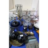 A brass wine bottle stand on an oval wooden base, pair of glass and spelter vases, and another, a
