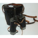 A pair of binoculars in leather case  Condition Report:Available upon request