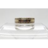 An 18ct white gold wedding band set with diamonds to an original total of approx 0.50cts (at least