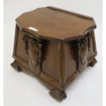 A Victorian carved oak coal hod Condition Report:Available upon request