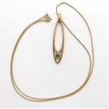A 9ct gold Ortak pendant set with an opal, on a 9ct snake chain, length 46cm, weight  Condition