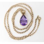 *Withdrawn*A 9ct curb link chain with a yellow metal amethyst pendant, length of chain 52cm,