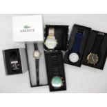 A collection of fashion watches, to include Ralph Christian, Lacoste etc Condition Report: