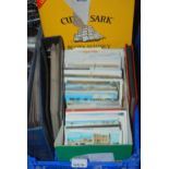 A box of various first day covers and a box of postcards etc  Condition Report:Available upon