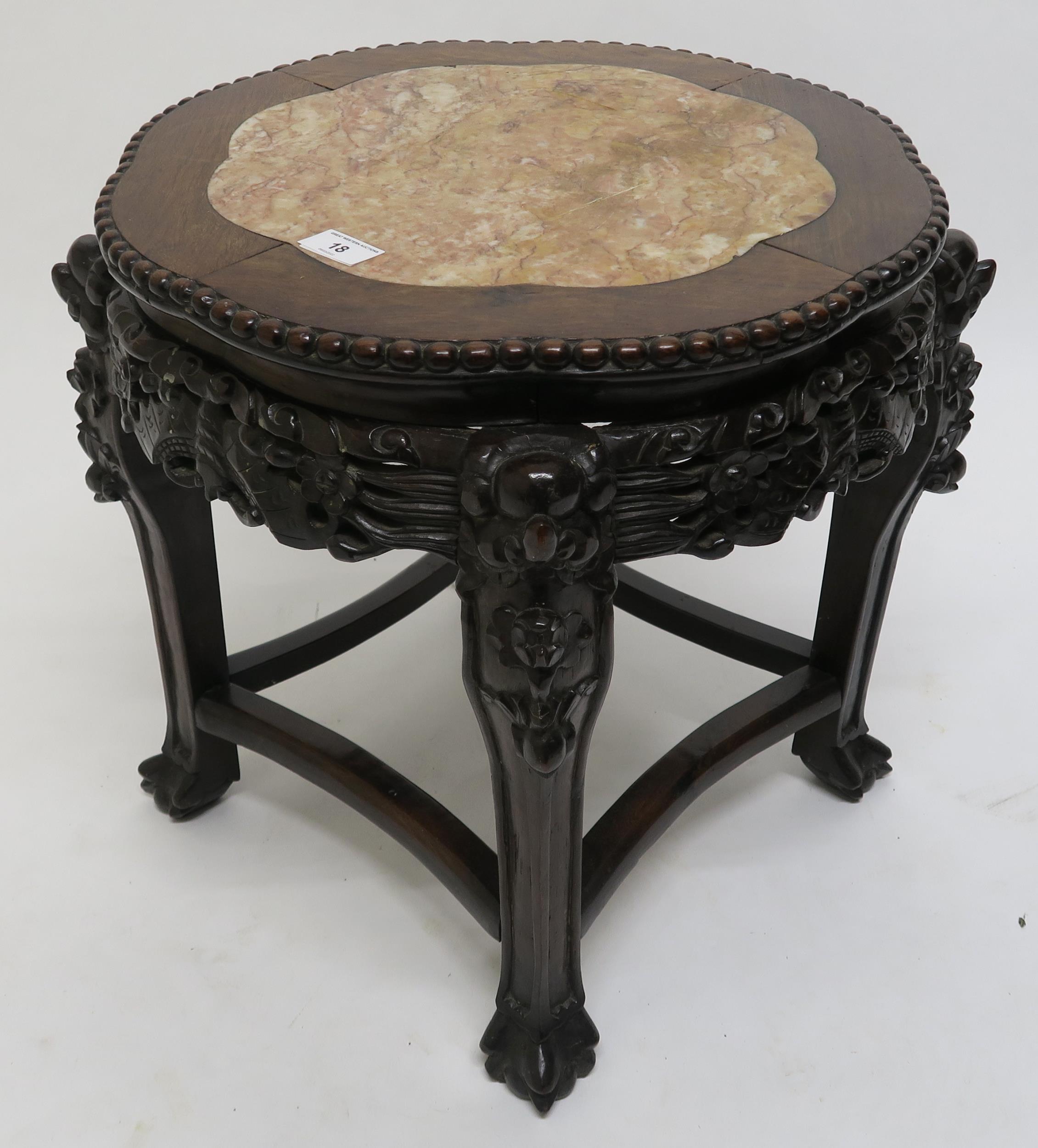 An Oriental hardwood marble top occasional table Condition Report:Available upon request