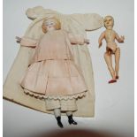 A vintage bisque-headed doll, 17cm high and another doll, 11cm high (2) Condition Report:Available