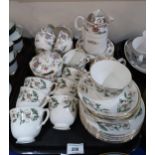 A Royal Worcester Pekin pattern part tea service & a Staffordshire floral decorated part tea service