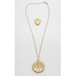 A 9ct gold back and front heart shaped locket and a further rolled gold round example with a 9ct