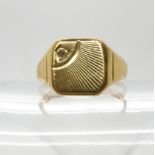 An 18ct gold diamond set gents signet ring, size S1/2, weight 5.8gms Condition Report:Available upon