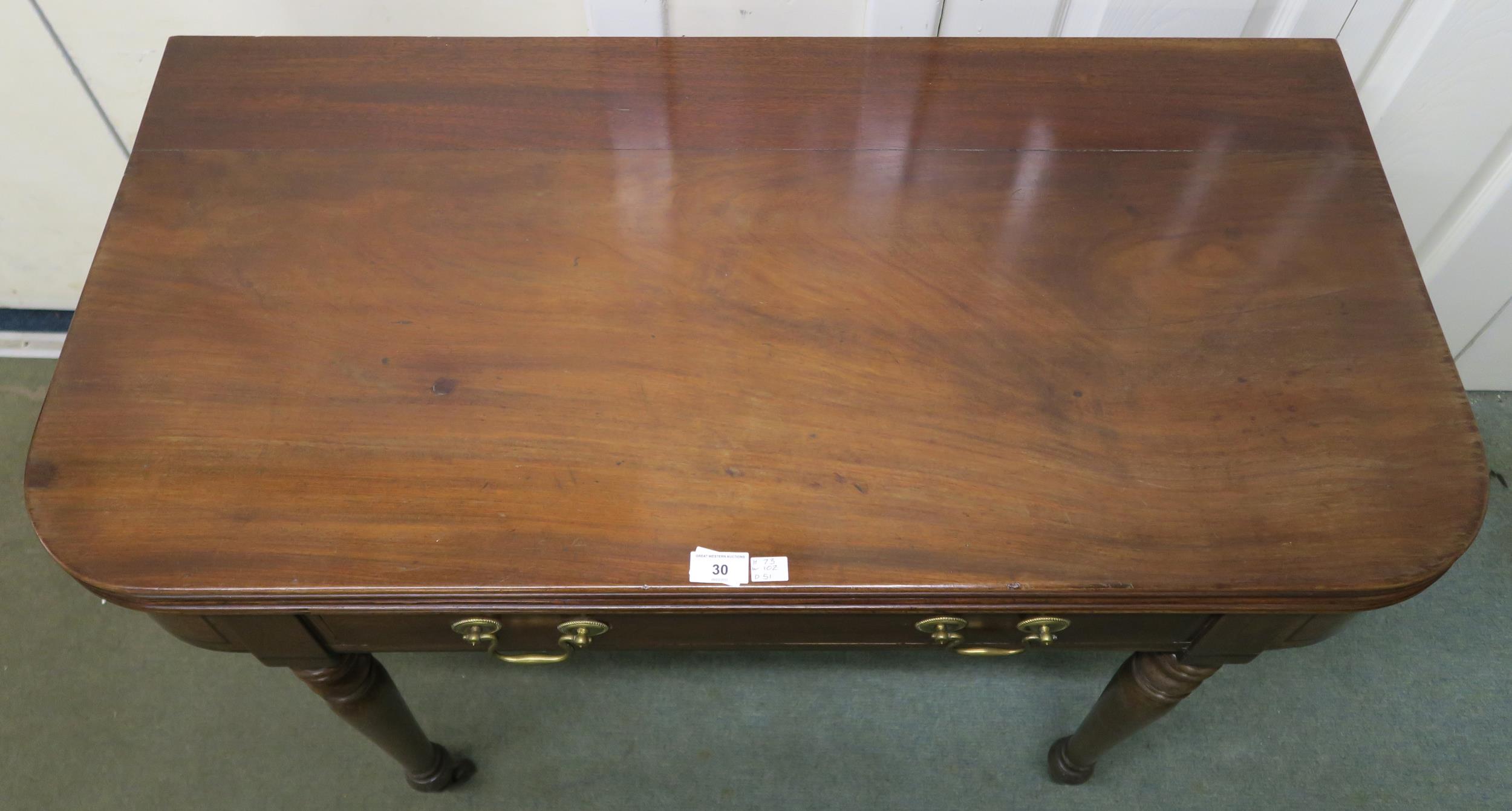 A Victorian mahogany single drawer foldover tea table, 73cm high x 102cm wide x 51cm deep - Image 2 of 5