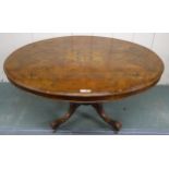 A Victorian burr walnut inlaid oval tilt top breakfast table on carved quadrupedal base, 74cm high x