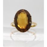 An 18ct gold and platinum citrine set ring, size O1/2, weight 4gms Condition Report:Available upon