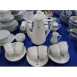 A Rorstrand white glazed and ribbed coffee set Condition Report:Available upon request