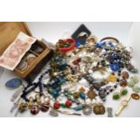 A collection of vintage costume jewellery to include beads brooches etc Condition Report:Condition