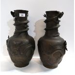 A pair of bronze vases decorated with dragons Condition Report:Available upon request