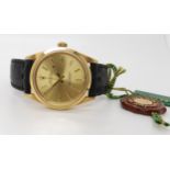 AN 18CT GOLD GENTS ROLEX OYSTER PERPETUAL with gold coloured dial, baton numerals and hands. back