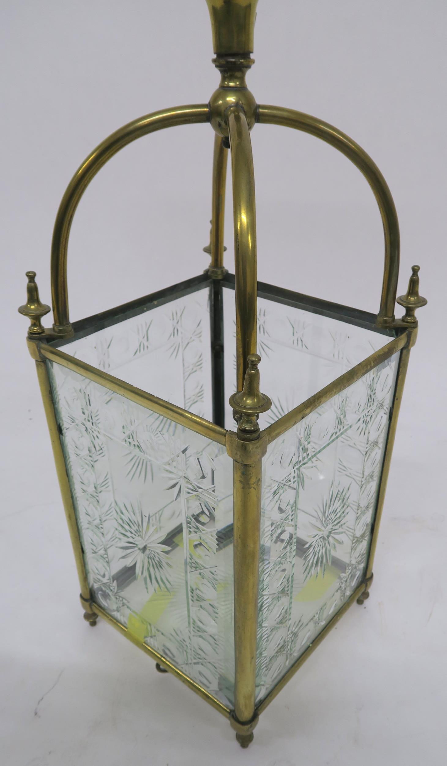 AN EDWARDIAN BRASS AND CUT GLASS HALL LANTERN set with four foliate cut panels and base, 90cm - Image 3 of 6