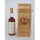 A BOTTLE OF MACALLAN 25 YEAR OLD MALT WHISKY distilled 1962, bottled 1987, in wooden presentation