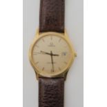 A 9CT GOLD OMEGA SEAMASTER QUARTZ WATCH with silvered dial gold coloured baton numerals and hands,