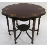 AN ARTS AND CRAFTS MAHOGANY TWO TIER WINDOW TABLE shaped top with stylized satinwood and mother of