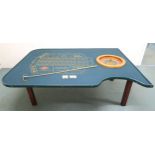 A 20TH CENTURY FRENCH CASINO ROULETTE TABLE PRODUCED BY CARO OF PARIS,  baize shaped top, mahogany