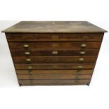 A 20TH CENTURY OAK EIGHT DRAWER ARCHITECTS PLAN CHEST, 113cm high x 150cm wide x 92cm deep Condition