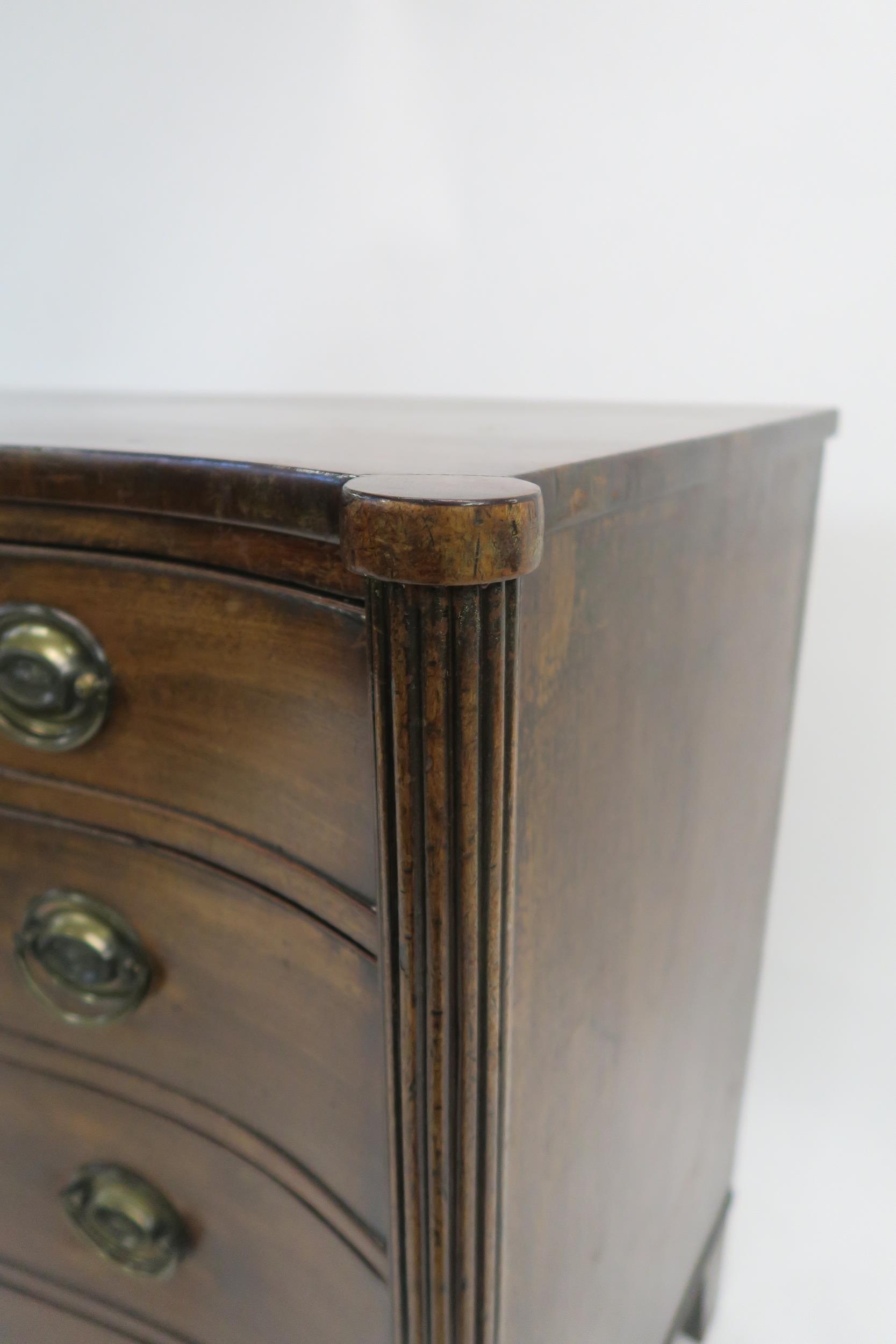 A 19TH CENTURY MAHOGANY SERPENTINE CHEST with four graduating drawers, flanked by fluted columns and - Image 9 of 19