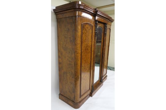 A VICTORIAN BURR WALNUT BREAKFRONT TRIPLE DOOR WARDROBE - Image 2 of 8