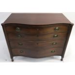A 19TH CENTURY MAHOGANY SERPENTINE CHEST with four graduating drawers, flanked by fluted columns and